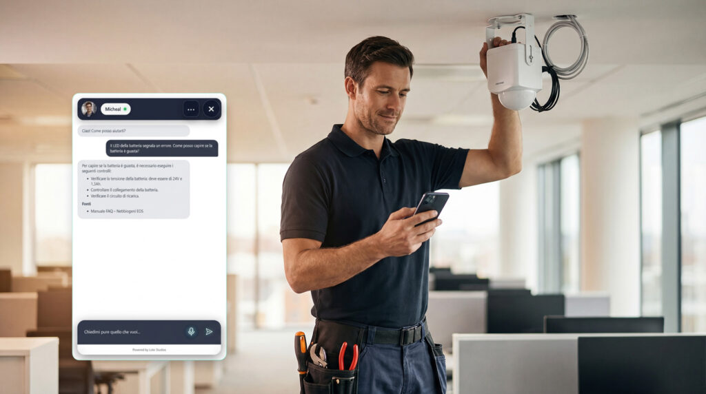 Interfaccia promozionale di “Aura Sicurezza” di Teknofog Srl, con design minimal nero e verde acqua. A sinistra il logo Aura Sicurezza e i partner tecnologici AWS, Loto Studios e OpenAI. A destra un assistente virtuale AI chiamato “Michael” con chat attiva che fornisce supporto tecnico su batterie e sistemi di sicurezza, mostrato all’interno di un widget moderno.