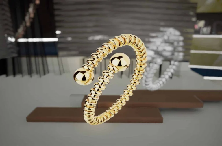 Close-up of a gold bracelet in a Carini jewellery showroom display case